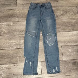 Vibrant High Rise Distressed Blue Jeans